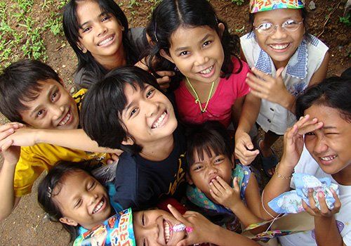 group of Filipino children. isonic cares about global communities. iSonic Web Design and Digital Marketing, Cleveland, Brisbane