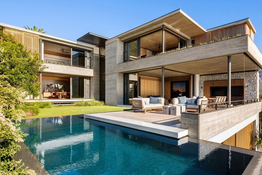 luxury custom home exterior with pool built by David Reid Homes. construction website, custom home builder website design, iSonic Web Design and Digital Marketing, Cleveland, Brisbane